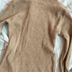brown turtle neck ripped top