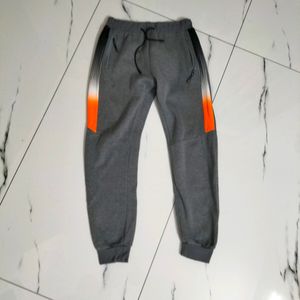 Grey ETEN joggers.