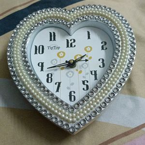 Beautiful heart shaped wall clock or table cloc