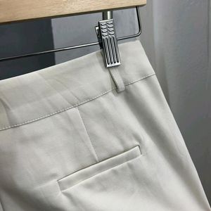Pleated wide legged high waisted trousers