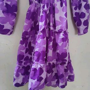 Purple Print And Flare Dress For Beautiful Women . this Dress Is For All Sizes Because It Is A Total Stretchable Cloth