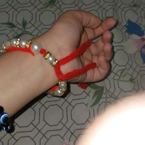 Hand bracelet