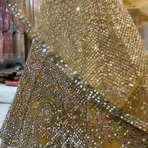 Golden Heavy Mirror Worked Lehenga