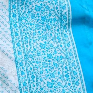 A Blue Silk Saree With Blouse And Peticoat