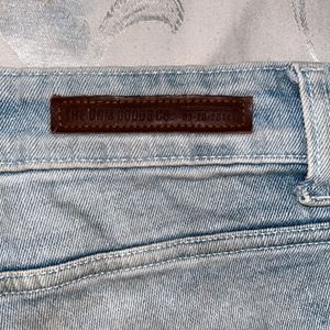 Distressed Blue Jeans