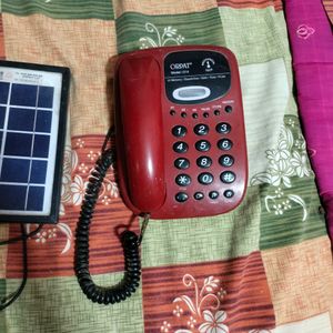 Solar Plate With Telephone As Freebies