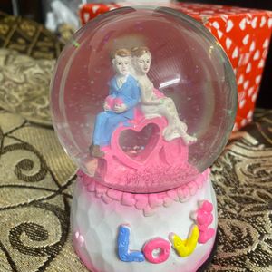 Small Couple Globe With Music Love Symbol