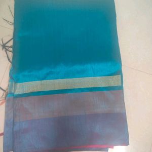 Bright Blue Silk Saree With Pink Border And Pallu