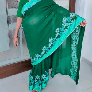 Bottle Green Floral Bordered Saree