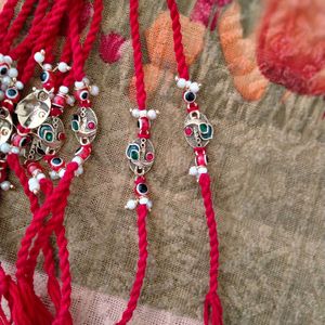 RAKHI with Morpankh, Red Evil Eye & Pearls