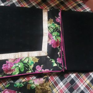 Black Saree With Thick border And Stitched Blouse.