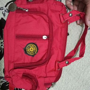 Red Colour Sling Bag With Many Compartment