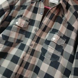 A Checkered Black And white Shirt With Full Sleeve