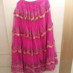 golden choli and dark pink ghaghra with duppatta