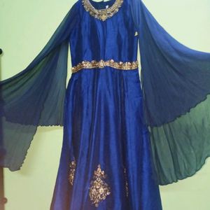 Festive Gown With Extended Cape Sleeves