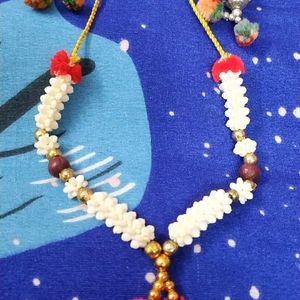 11 Goddess Pearl Necklace, 10 Small,1 Medium