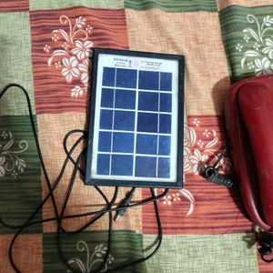 Solar Plate With Telephone As Freebies