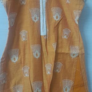Stitched golden color kurta with shawl