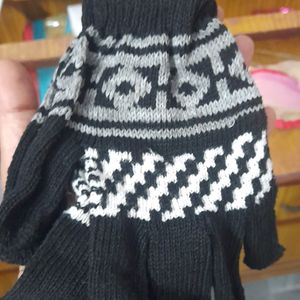 Navy blue sweaterand, black and white Winter glove