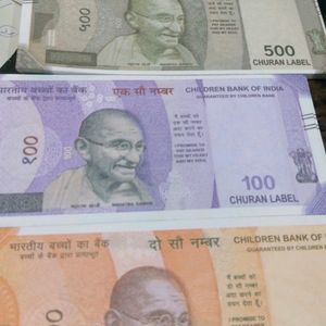 Playing Fake Currency Note