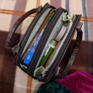 Brown Handheld bag