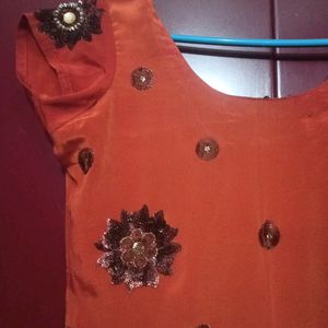 Dark orange Kurti with embroidery work