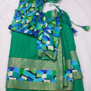 "Elegant Green  Saree with Vibrant Mosaic Blouse