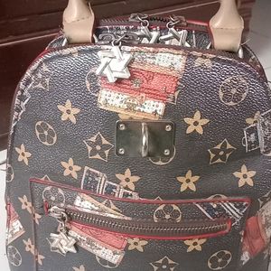 LV Brown Leather Small Backpack cum hand bag...