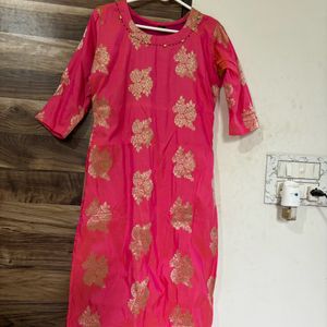 A Bright Pink Kurta With Neck Design