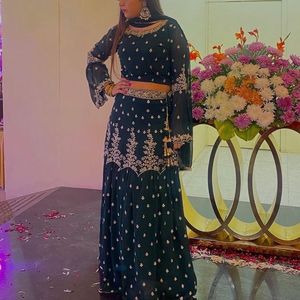 Dark Green Colored lehenga With Blouse And Duppata