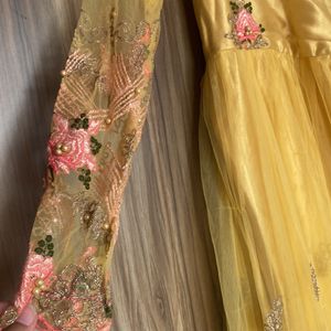 Yellow Colour Net Gown Full Slvees