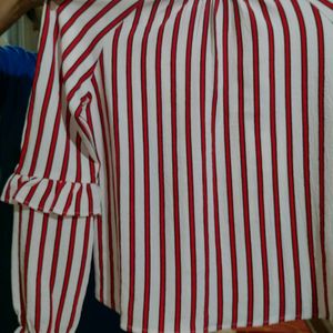 Full Sleeved Synthetic Stylish WomenTop, Turtle Neck, Two Buttons On The Back. Red And White Coloured Vertical Design.