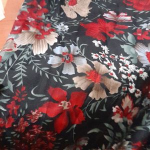 Beautiful black floral print polyester culotte...strachable elastic...no flaws...