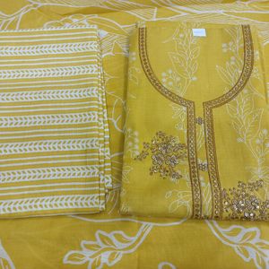 Unstitched Yellow Suit