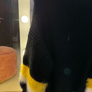 Feathered Sleeve High Neck Sweater