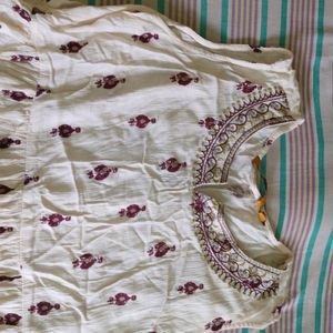 Beautiful A Line White Nd Maroon Printed Dress.