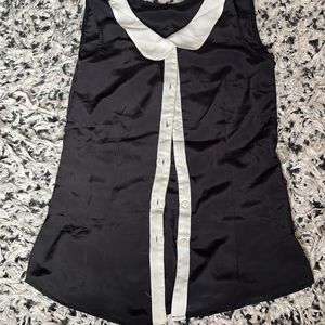 Black Sleeveless Shirt With White Collar Detail