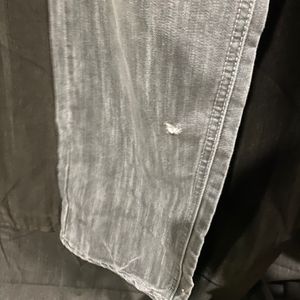 Grey Jeans With Slight Damage