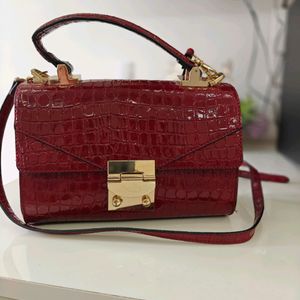 Aldo burgandy/Maroon Sling Bag