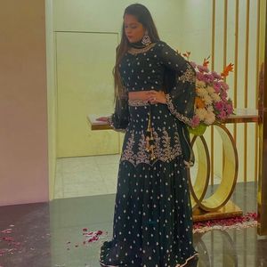 Dark Green Colored lehenga With Blouse And Duppata