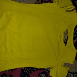 A Yellow Color Shoulder Cut Top.