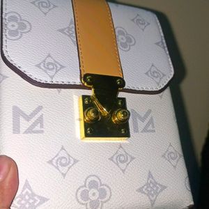 White Sling Bag With Tag Attached