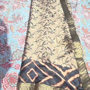 Beige And Black Coloured Saree Without Blouse