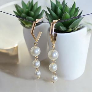 3 COMBO PEARLO EARRINGS.