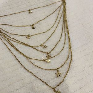 Gold Multilayered Star Charm Necklace