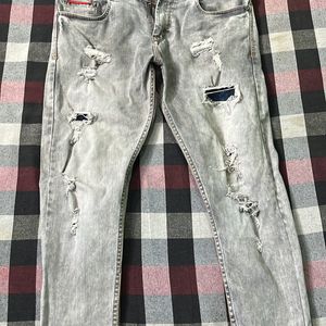 DNM branded raw jeans