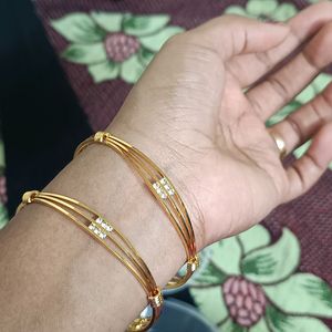 Real gold look bangles with stone work