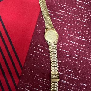 Rochees golden watch