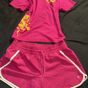 Pink Set Of T-shirt & Shorts