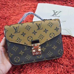 LOUIS VUITTON SLING BAG